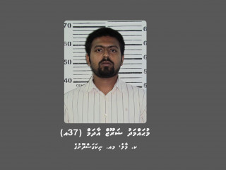 Mohamed Sharooj Adam is being located to be produced before a local court for custodial interrogation