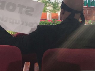 MP Areef holds silent protest against govt. during Parliament inaugural session