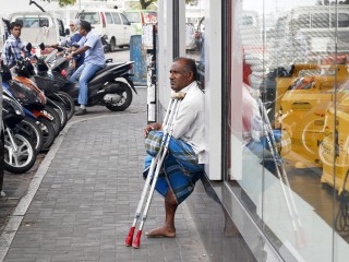 What percentage of the Disability Act has actually been implemented in eight years?