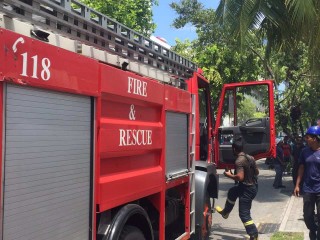 MNDF officers near a fire truck: fire broke out in thimarafushi island