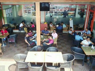 Barista denies reports of arrest in Friday night search