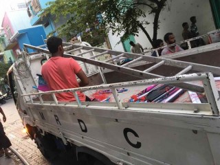 A worker in an MRDC truck