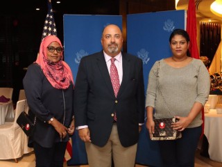 Ambassador Atul Keshap with Yameen Rasheed's mother (l) and family member