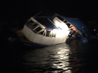 Rescue officers free 50-foot vessel that crashed into Malé's 'industrial village'