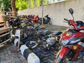 Motorcycles at parking zone, scorched