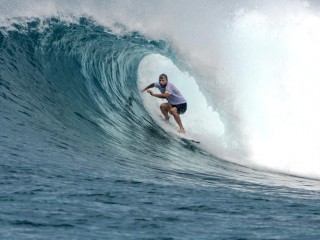 Taj Burrow riding a wave at the sultans
