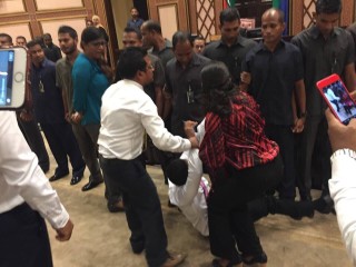 MPs in Parliament facing off against security officials