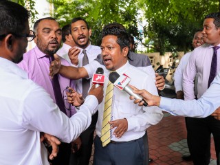 MP Imthiyaz outside Parliament premises being heckled by pro-Government MPs