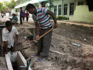 Workers develop a road in Male\'