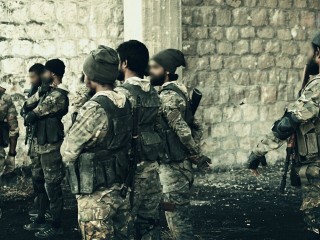 ރާއްޖެއިން ބޭރުގައި ހިނގަމުންދާ ހަނގުރާމައެއްގައި ބައިވެރިވަމުންދިޔަ ދިވެހިންތަކެއް (ފައިލް ފޮޓޯ)