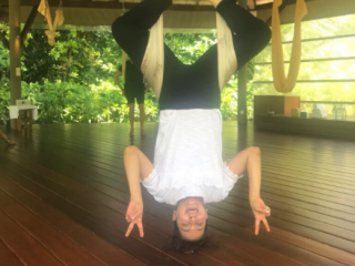 Bollywood superstar Juhi Chawla hangs upside down while on holiday in Maldives