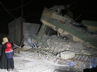 ބިންހެލުމާ ގުޅިގެން އިރާގުން ހަލާކުވެފައިވާ އިމާރާތެއް 