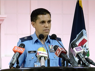 Head Superintendent of Drug Enforcement Department Moosa Ali briefing press on drugs bust