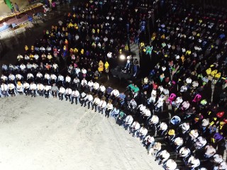 An aerial photograph of an opposition rally held at Thinadhoo island of Gaafu Dhaalu Atoll