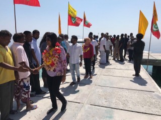 Members of the opposition arriving in the island