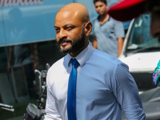 MP Faris Maumoon photographed while entering the Criminal Court premises in capital city Malé