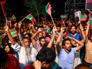 Members of the opposition movement gathered near MDP haruge following Supreme Court ruling