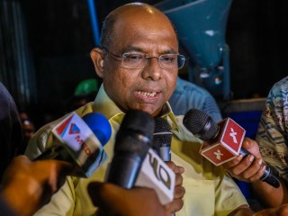 MP Abdulla Shahid speaking to the press at an opposition rally