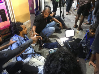 Journalists attempt to recover from close range use of pepper spray on them