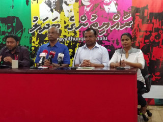 Members of the opposition at a press conference