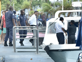 MP Ilham being escorted back to detention after his remand hearing on Sunday