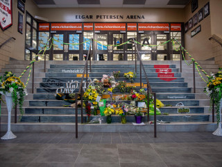 A vigil was held on Sunday, at the arena where the team was heading to play