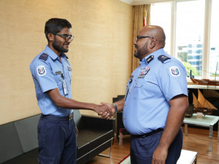 Acting Commissioner Nawaz (R) met Lance Corporal Rifaau