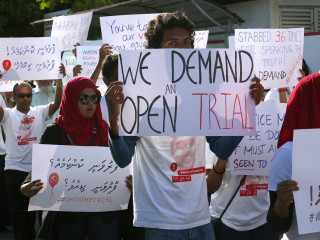 Human rights activists call for justice in writer Yameen Rasheed\'s murder at a rally held in capital city, marking a year since he was found stabbed to death at his home in April, 2017