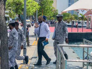 MP Faris Maumoon escorted by correctional service officers