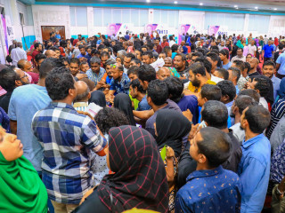 People gathered to submit application papers for a housing program held in 2018