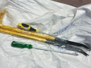 Officers had found a mobile phone, a bag, a mask, and a pair gloves