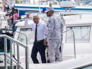 Former Commissioner of Police, Ahmed Areef being brought to the capital city for court hearing