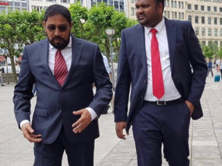 Jumhooree Party\' President Ali Waheed (R) with party leader Qasim Ibrahim