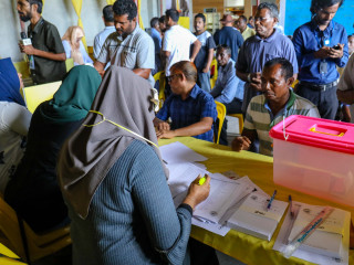 Party members vote at an earlier primary election held by the Maldivian Democratic Party