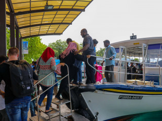 Passengers boarding a ferry to Hulhulé at the terminal in Henveiru of capital city Malé