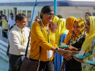 MP Mariya Didi being greeted upon arrival at AA.Ukulhas for MDP\'s national congress meeting