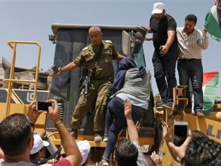 އިސްރާއީލުގެ އަމަލުތަކާ ދެކޮޅަށް ފަލަސްތީނު ރައްޔިތުން ކުރި މުޒާހަރައެއްގެ ތެރެއިން