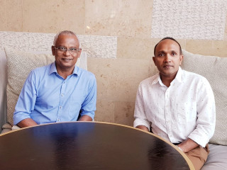 Opposition coalition candidate Solih (r) with former Vice President Jameel
