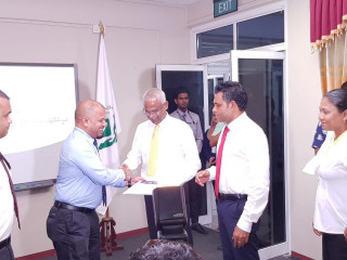 Elections Commission president Ahmed Shareef accepts Ibrahim Mohamed Solih\'s candidacy papers