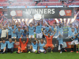 ސިޓީގެ ކުޅުންތެރިން ކޮމިއުނިޓީ ޝިލްޑް އުފުލާލަނީ