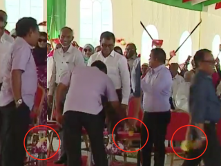 މޭޒުމަތީގައި ބޭއްވި މާ، ރައީސް އަބްދުﷲ ޔާމީން ނަންގަވާ ވީޑީއޯއިން ފެންނަ ސްކްރީން ޝޮޓްތަކެއް