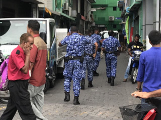 Police officers active near Shinetree building