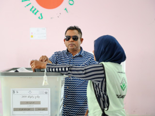 Man gives his vote in the presidential election