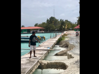 Guraidhoo erosion: tides swallow land under breakwater
