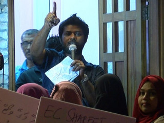 Former President\'s Office spokesperson Ibrahim Muaz Ali at a rally, claiming that the 2018 elections were rigged