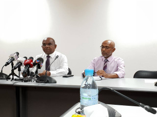 Members of the transition committee at Thursday\'s press conference