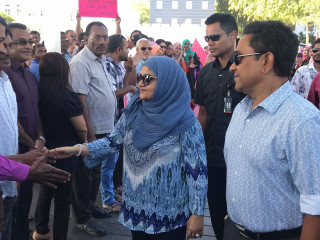 The first lady was greeted at the Velana International Airport by President Abdulla Yameen, a few loyal cabinet ministers, and supporters of the ruling party
