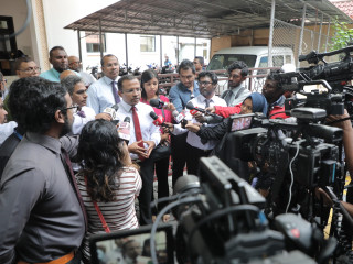Opposition lawmakers speak to the press after submitting no-confidence motion against Speaker Abdulla Maseeh