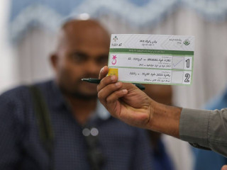 A polling place office counting votes in the presidential election, 2018