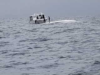 Three people were aboard the vessel at the time of the incident